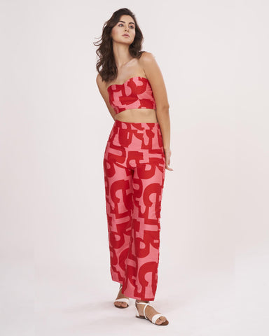 Red geometric printed co-ord set with tube crop top and wide-leg palazzo pants