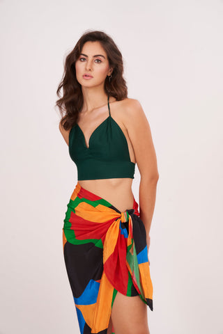 Midi-length cover-up with a breezy high-slit cut and relaxed drape, essential for tropical vacations and pool parties.